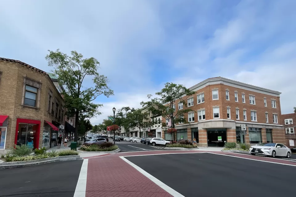 View of empty brick crosswalk in shopping district in Greenwich, Connecticut